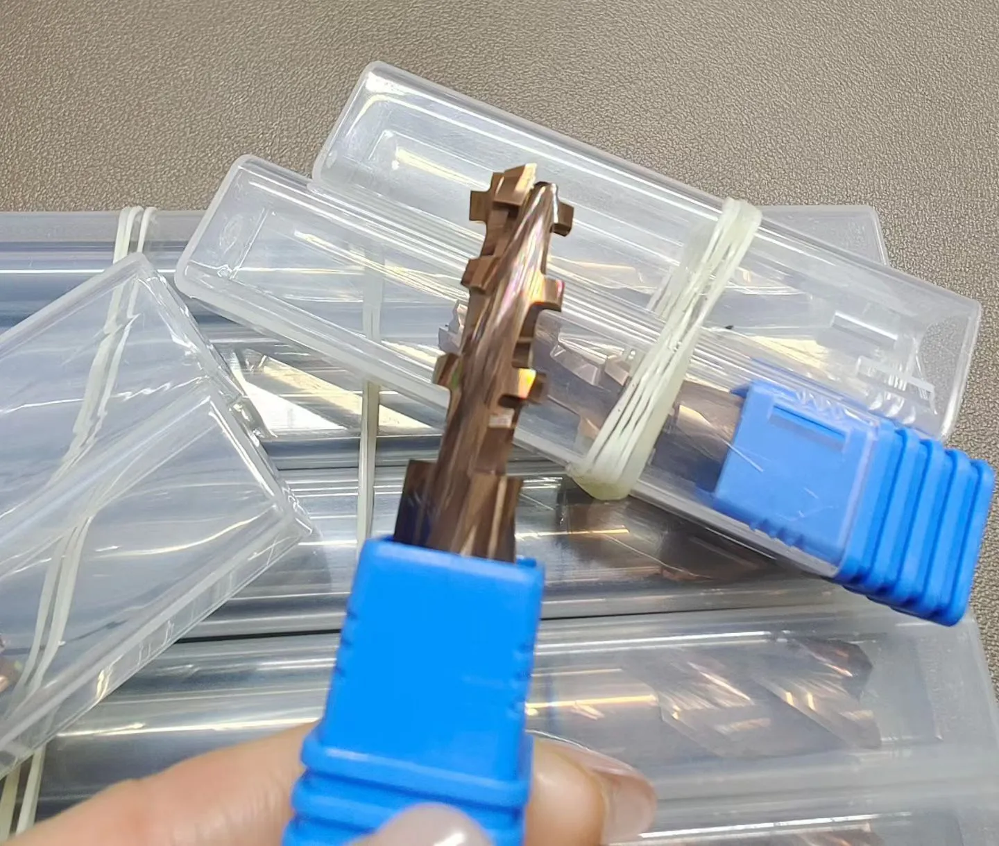 Custom forming end mills, including tapered and stepped profiles