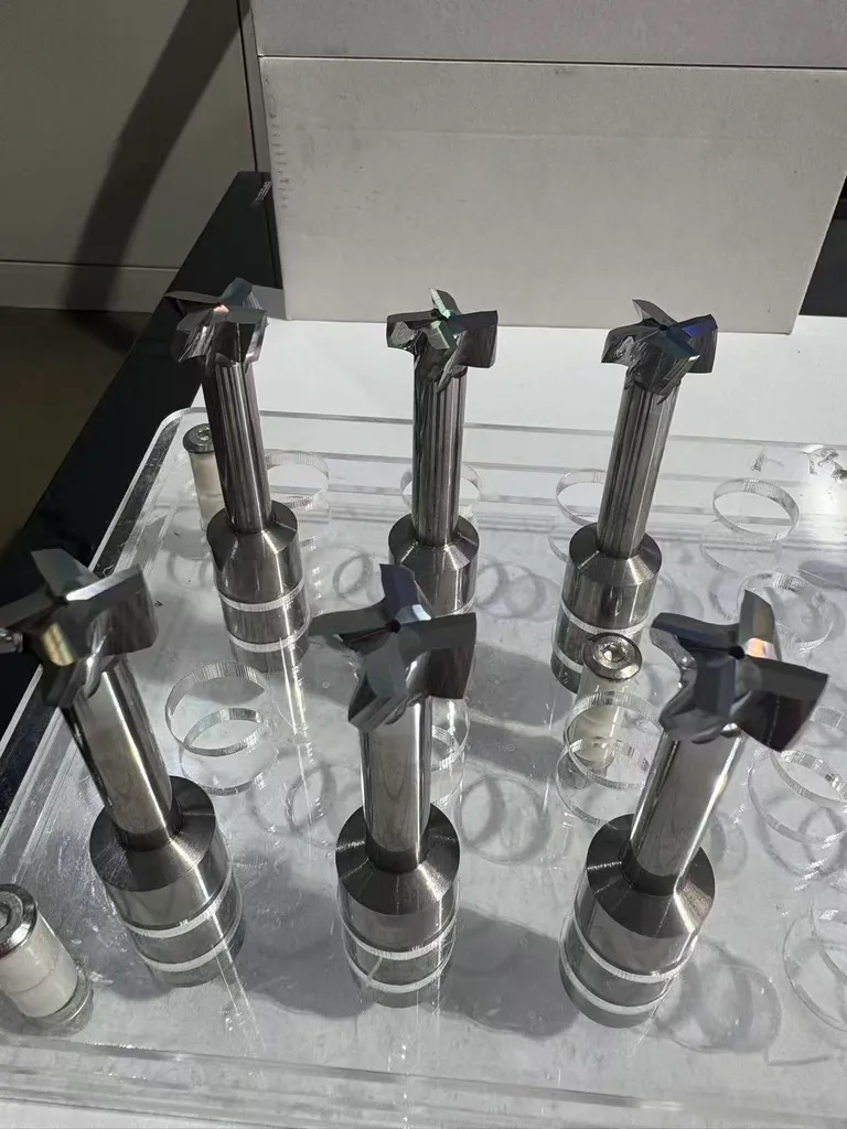 Custom profile cutters with coolant-through holes shown before coating